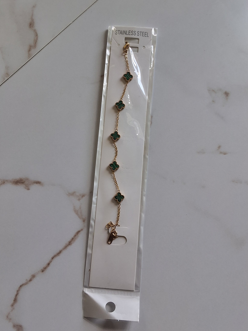 Gold Stainless Steel Bracelet with Green Clover Accents